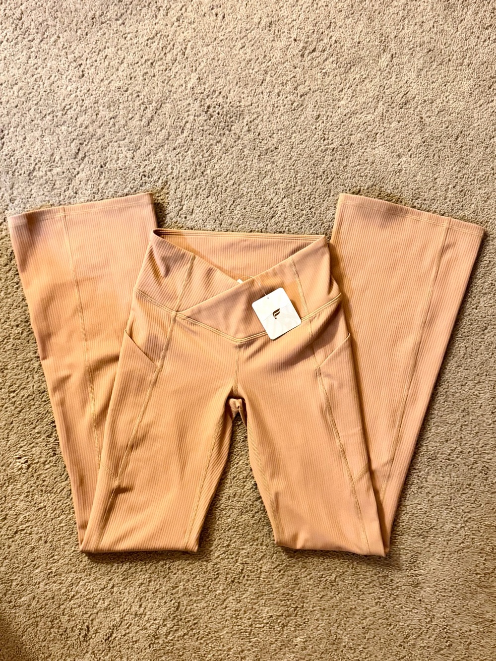 NWT Fabletics gold/tan crossover flare leggings